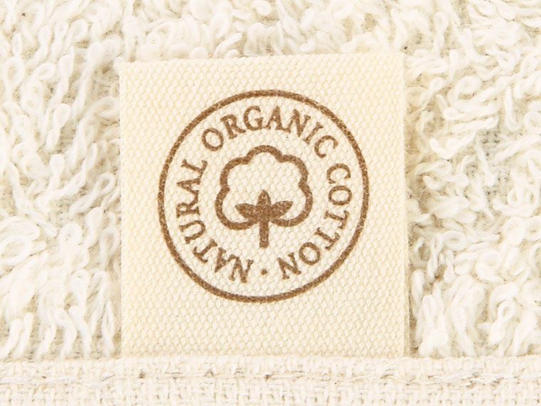 オーガニックコットン使用プレーンハンドタオルのタグ