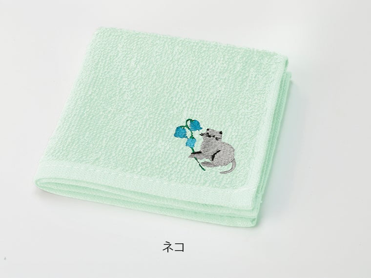 ステリオ 刺繍タオルハンカチの本体カラーグリーンにはネコが刺繍されています。
