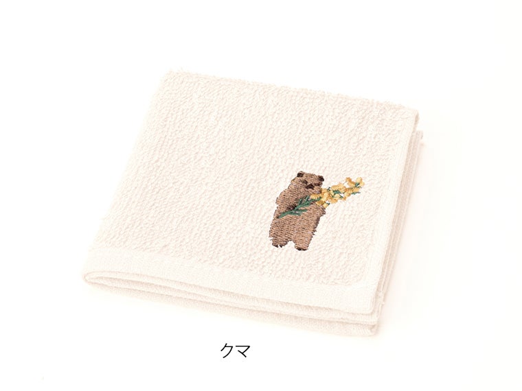 ステリオ 刺繍タオルハンカチの本体カラーホワイトにはクマが刺繍されています。